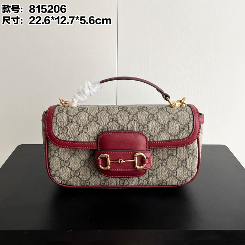 G*u*i top handle bags